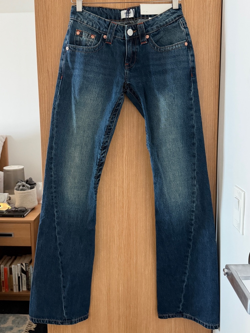 Motel Rocks Extra Low Rise Twisted Seam Jeans in Mid Blue Tint